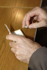 Image showing Hands of the groom with wedding rings