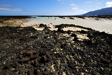 Image showing people spain  hill white  beach  spiral  black    lanzarote 