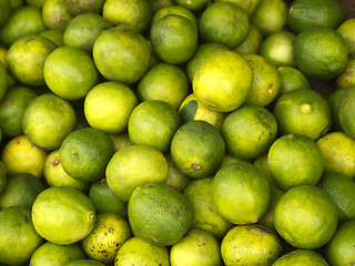 Image showing Green limes on the market