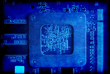 Image showing Electronic circuit board blue grunge background