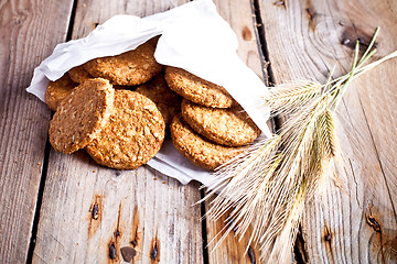 Image showing fresh crispy oat cookies and ears