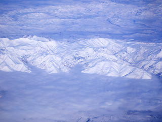 Image showing Snowy mountains from above