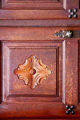 Image showing spain knocker lanzarote  door wood in the red brown 