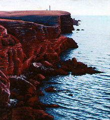 Image showing red coast with lighthouse