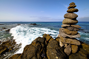 Image showing in lanzarote coastline  froth    rock stone sky cloud beach     