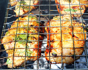 Image showing Steaks on the grill 