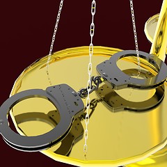 Image showing Scales of justice and handcuffs