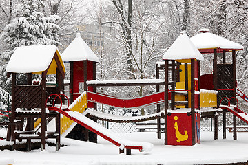 Image showing Children playground on snow blizzard