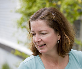 Image showing Woman Inspects Her Garden