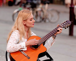 Image showing Beautiful woman with guitar