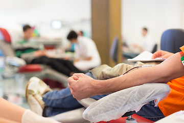 Image showing Nurse and blood donor at donation.