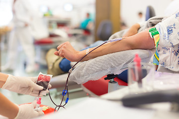 Image showing Nurse and blood donor at donation.