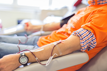 Image showing Blood donor at donation.