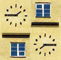 Image showing Symetrical clocks