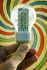 Image showing Light bulb held in palm