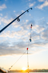 Image showing fishing on a lake before sunset