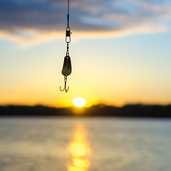 Image showing fishing on a lake before sunset