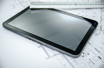 Image showing tablet and architectural construction design document tools back
