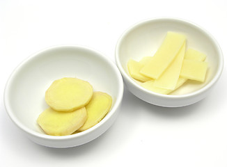 Image showing Ginger and bamboo in two bowls of chinaware