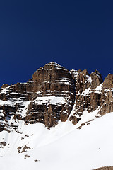 Image showing Snowy rocks in nice spring day