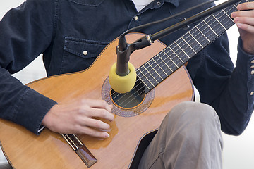 Image showing Playing guitar