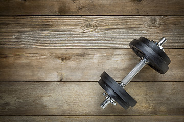 Image showing exercise concept - iron dumbbell 