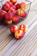 Image showing basket of nectarines