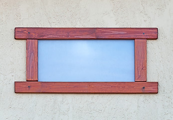 Image showing Window in a wooden frame.