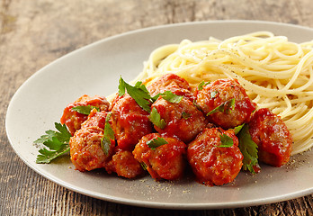 Image showing Meatballs with tomato sauce and spaghetti
