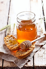 Image showing crackers and honey