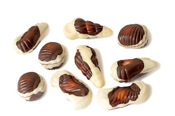 Image showing Chocolates of a various form on a white background.