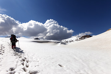 Image showing Two hikers on snowy plateau