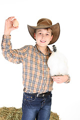 Image showing Boy with chicken and egg