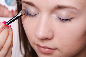 Image showing Beautiful girl paint eyelids