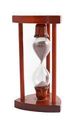 Image showing wooden hourglass over white