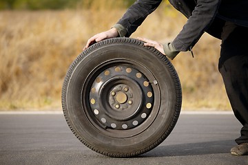 Image showing Wheel on road