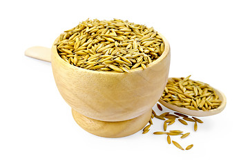Image showing Oats in a bowl and spoon