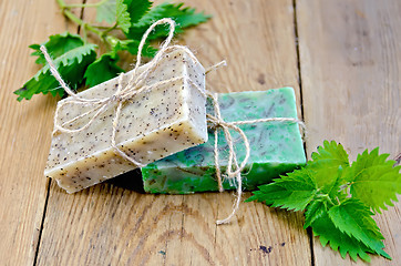 Image showing Soap homemade with nettle on the board