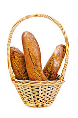 Image showing Rye baguettes in a wicker basket