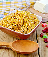 Image showing Curd red in bowl with candied fruit and spoon