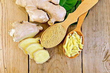 Image showing Ginger powder and grated in spoon with root on board