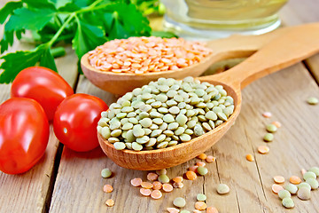 Image showing Lentils red and green with tomato on board