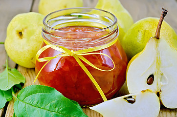 Image showing Jam pear with pears and leaves on board