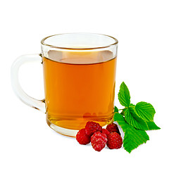 Image showing Tea with raspberry in glass mug