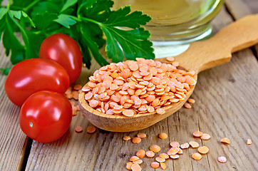 Image showing Lentils red with oil on board