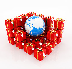 Image showing Traditional Christmas gifts and earth. Global holiday concept