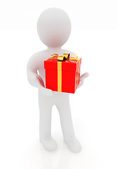 Image showing 3d man gives red gift with gold ribbon