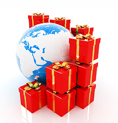 Image showing Traditional Christmas gifts and earth on a white background. Glo