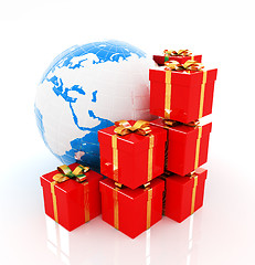 Image showing Traditional Christmas gifts and earth on a white background. Glo