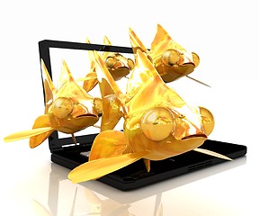 Image showing Gold fishea and laptop